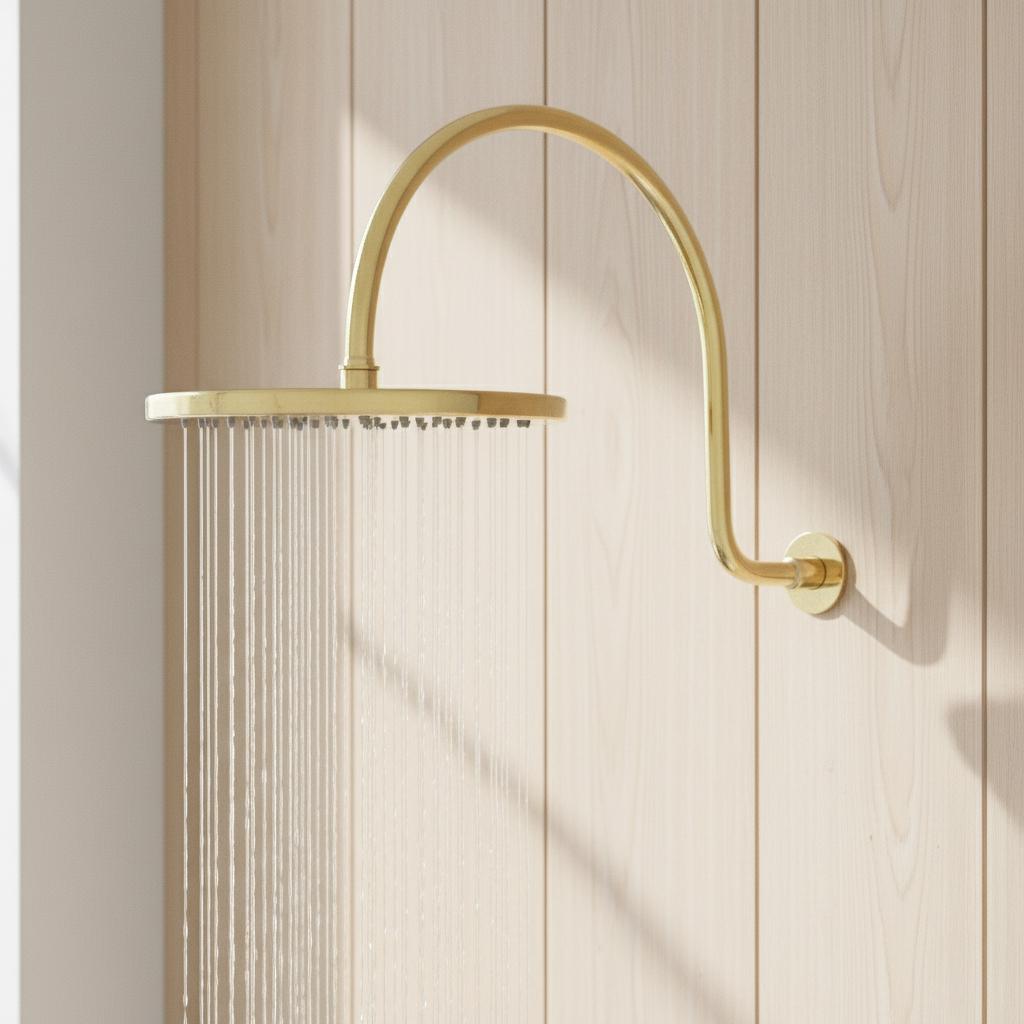 Gold shower head mounted on a wooden wall