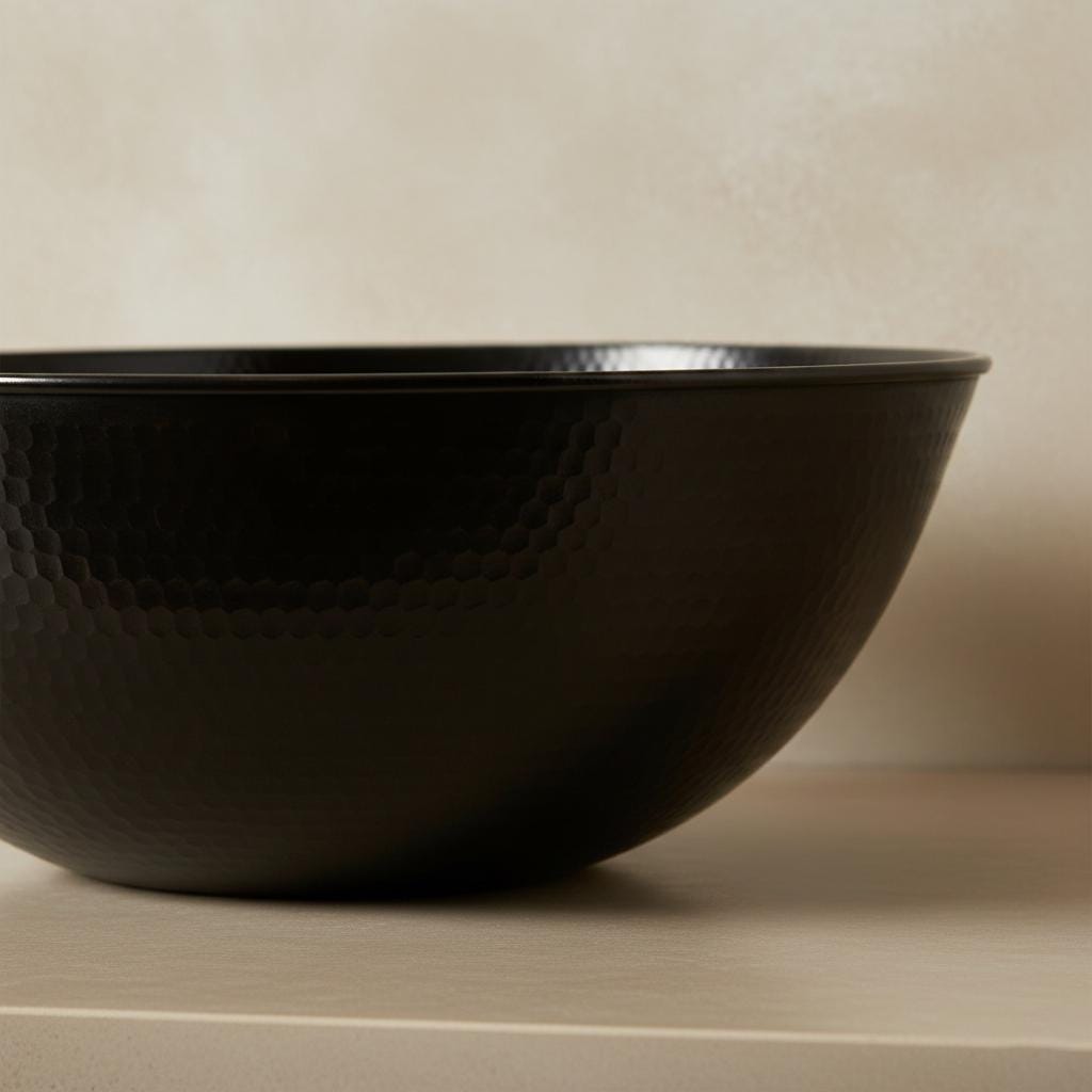 Black bowl on a beige background