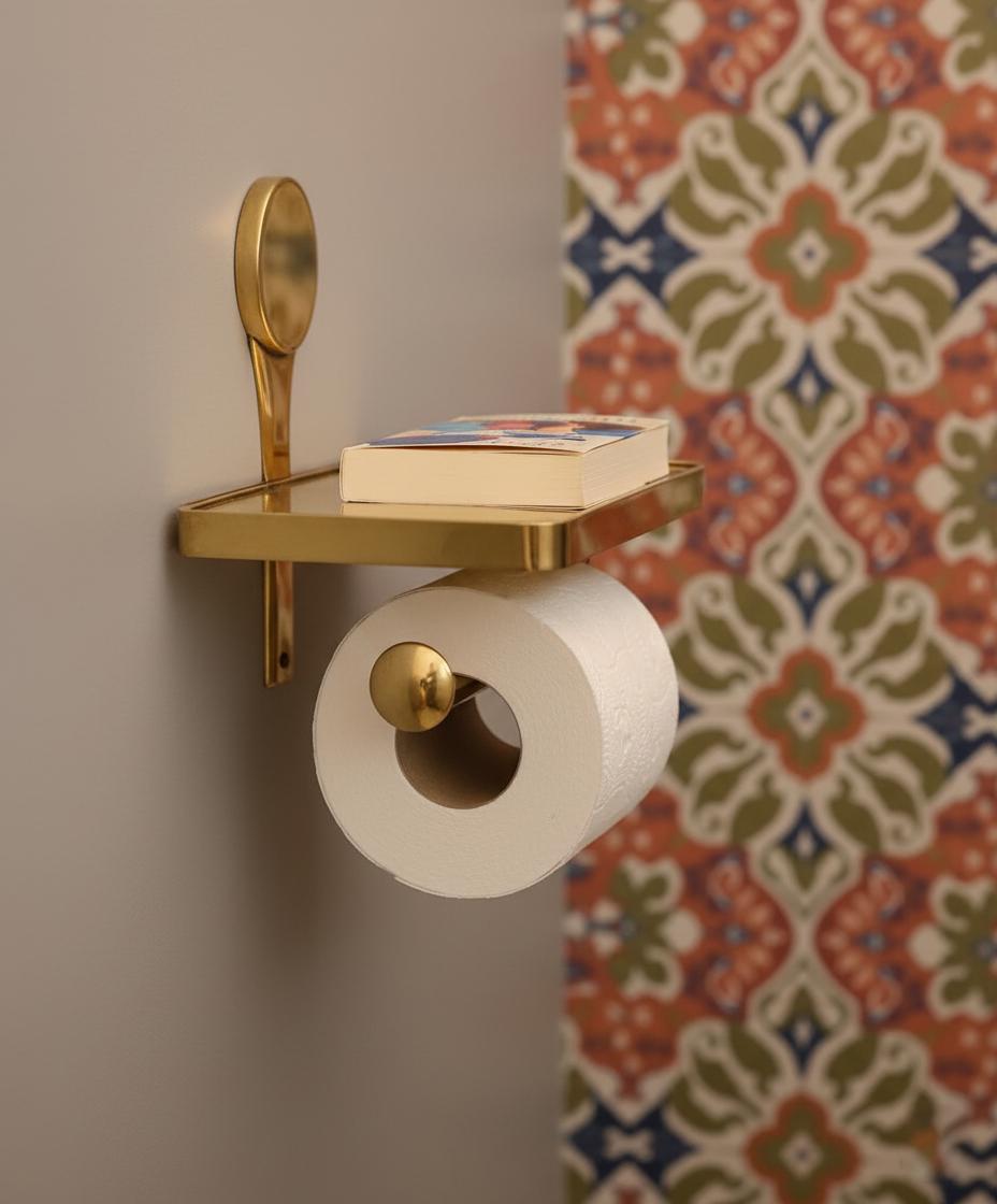 Unlacquered brass toilet paper holder with shelf wall mounted