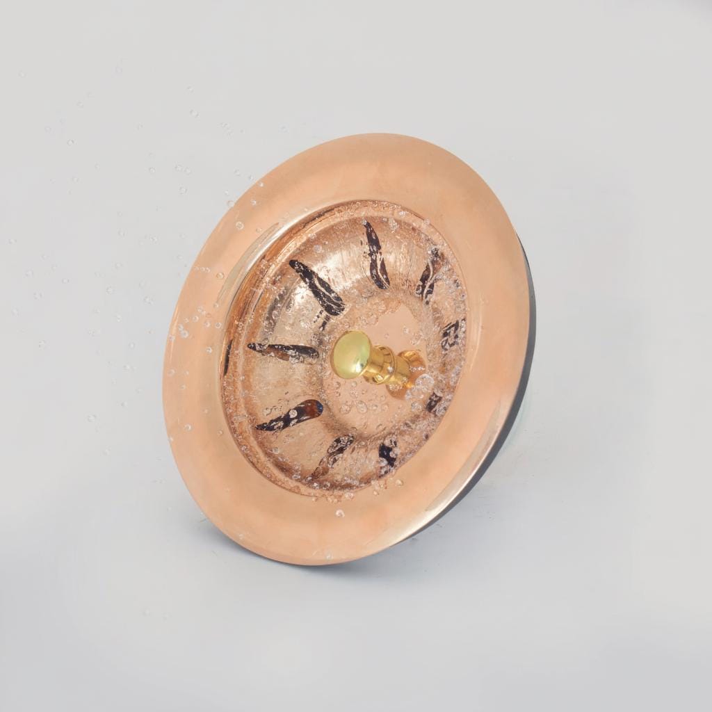 Round ceramic incense holder with decorative elements on a light gray background