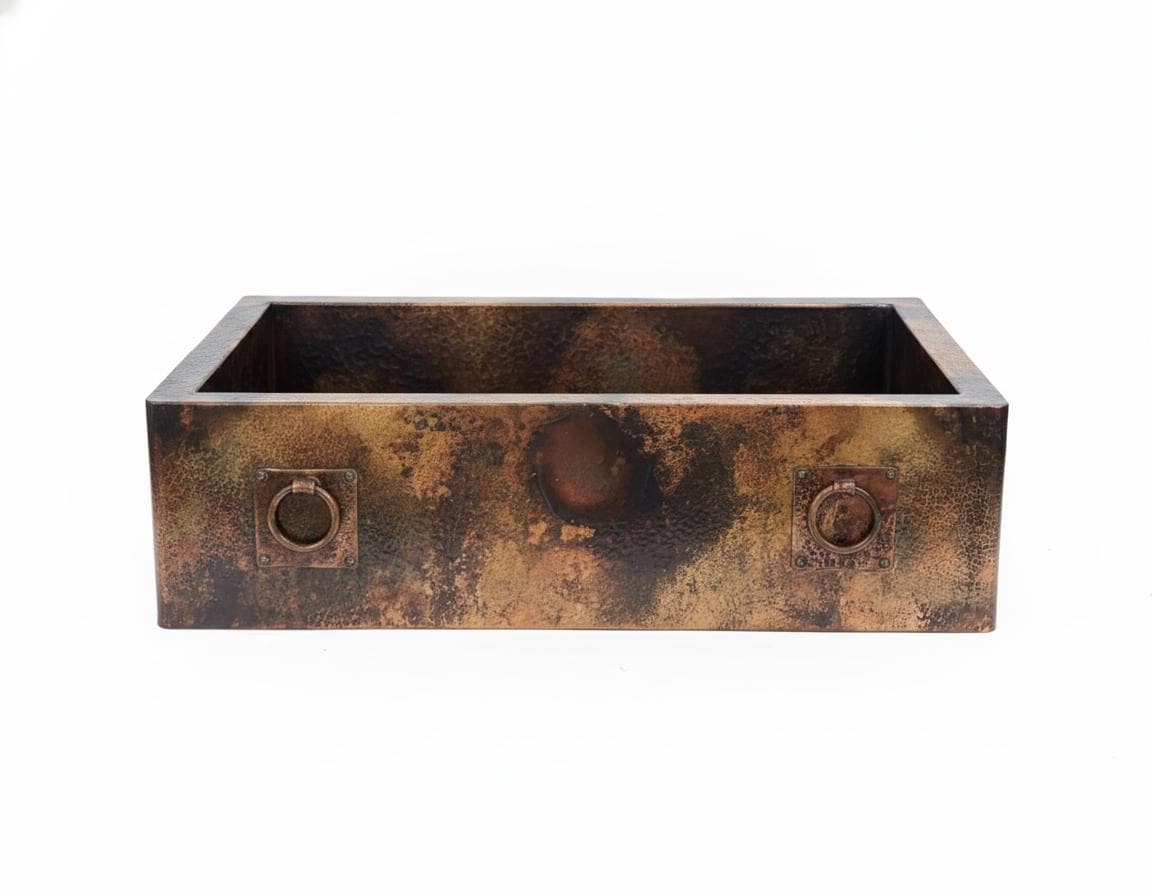 Rustic metal sink with a distressed finish on a white background