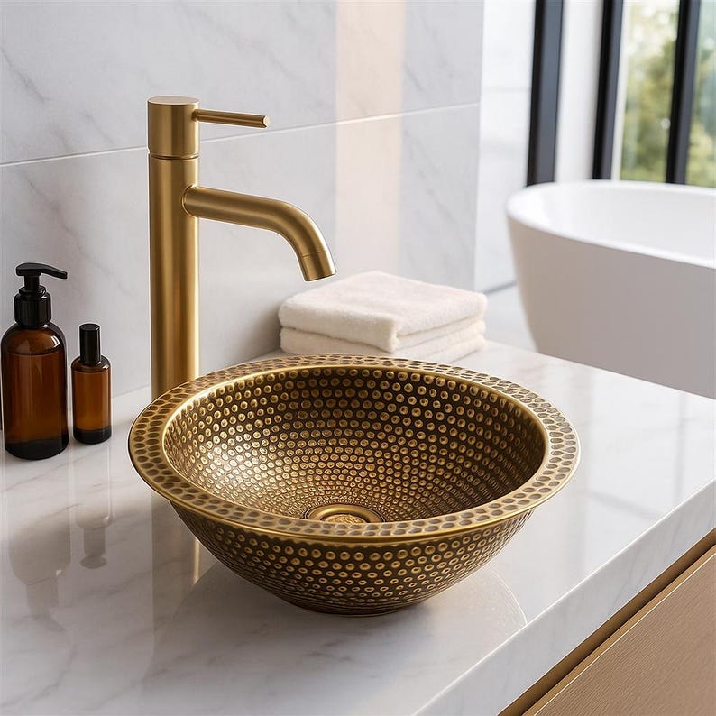 Artisan round brass bar sink with golden finish and pop-up drain