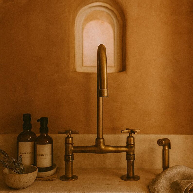 Brass bridge faucet with sprayer and cross handles

