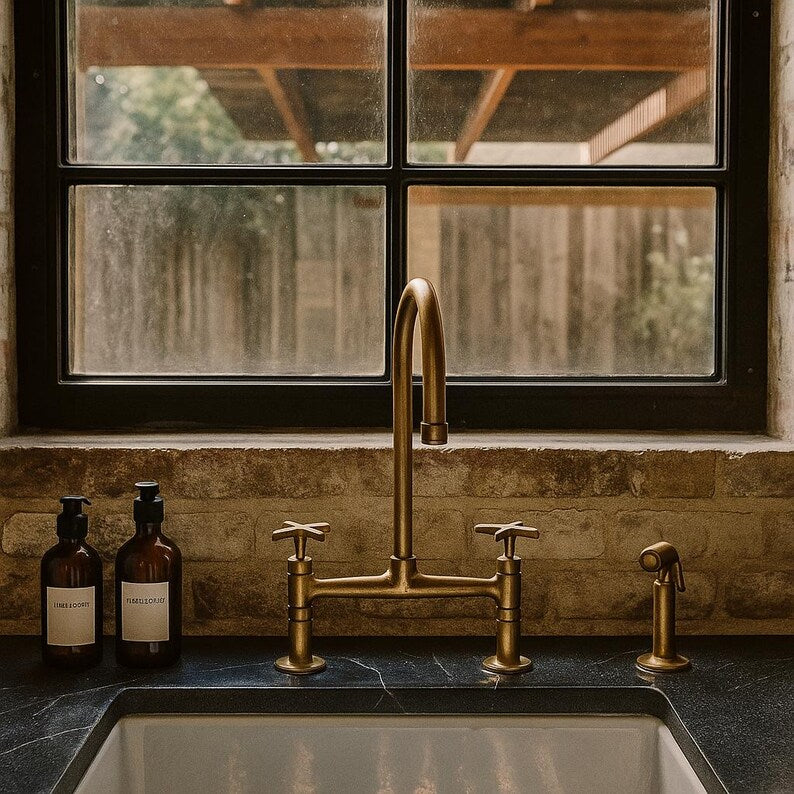 Brass bridge faucet with sprayer and cross handles


