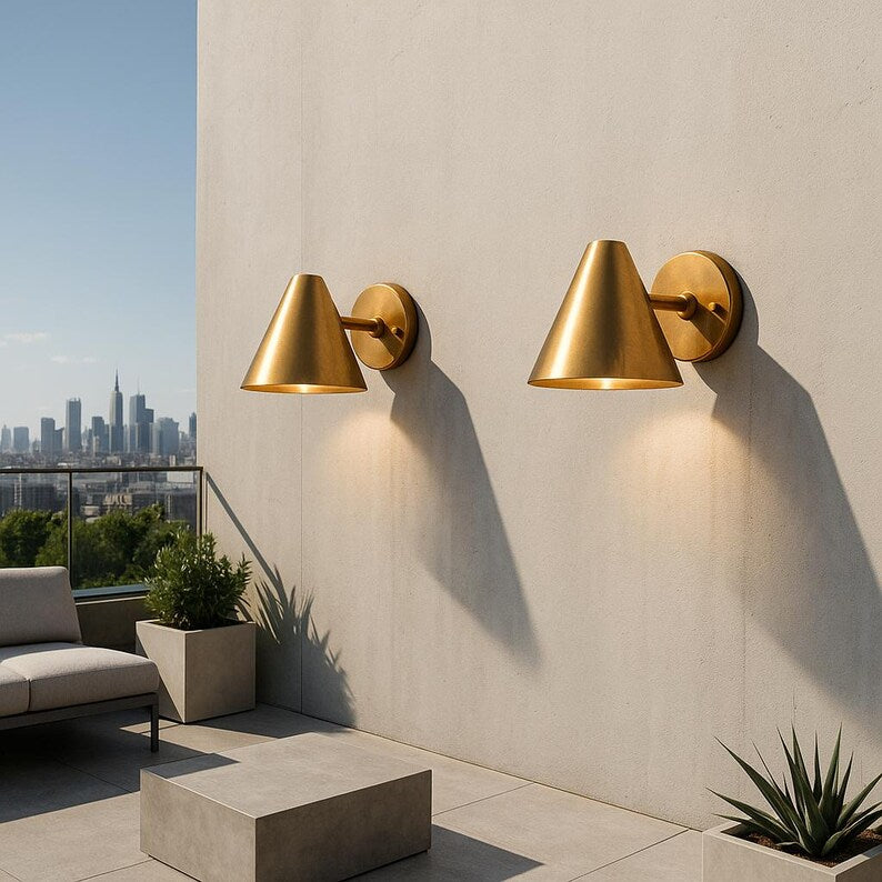 Brushed brass cone wall sconce with funnel shade – mid-century modern lighting

