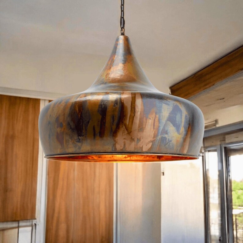 Burnished Moroccan copper pendant light with flame patina

