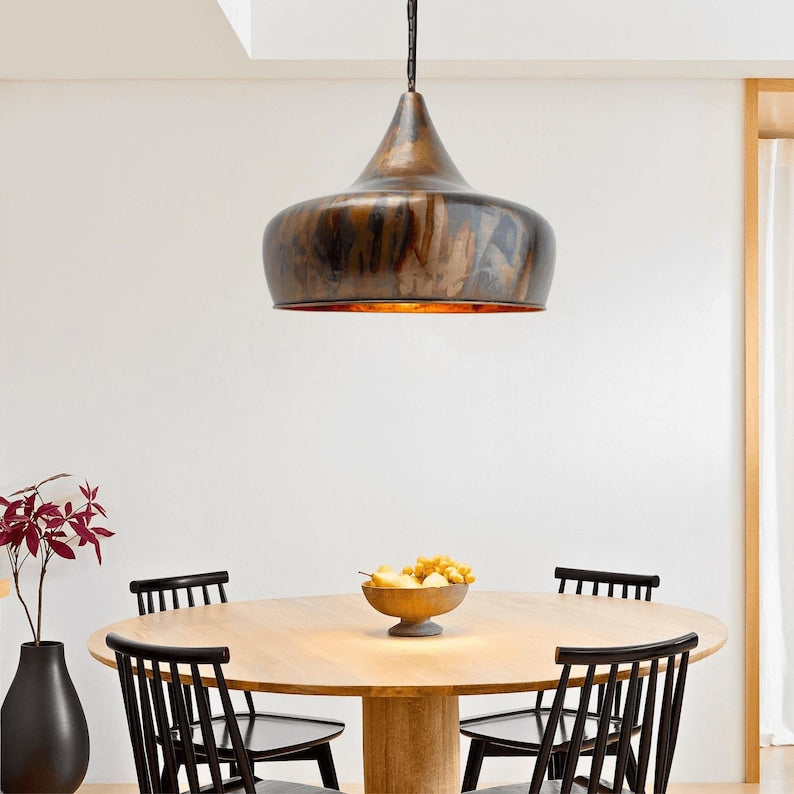 Burnished Moroccan copper pendant light with flame patina

