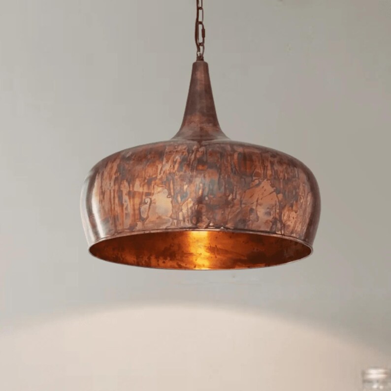 Burnished Moroccan copper pendant light with flame patina