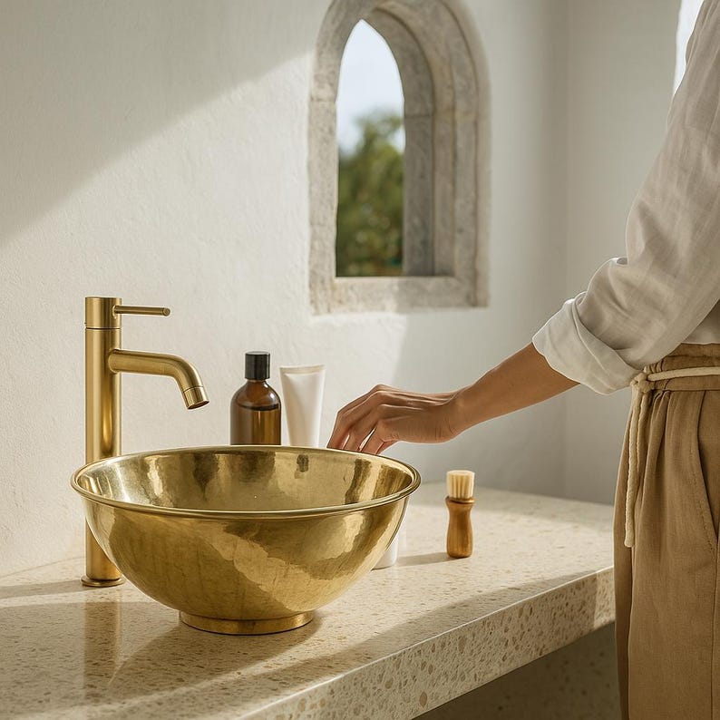 Hand-hammered brass sink with modern polished gold look