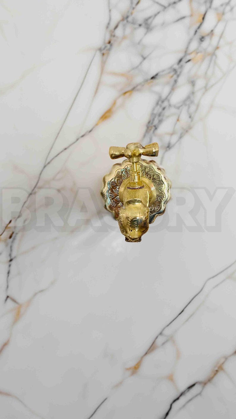 Handcrafted Moroccan Unlacquered Brass Fish-Shaped Wall-Mount Faucet – Vintage Solid Brass Tap for Bathroom, Kitchen, or Garden
Handcrafted Moroccan Unlacquered Brass Fish-Shaped Wall-Mount Faucet – Vintage Solid Brass Tap for Bathroom, Kitchen, or Garden
