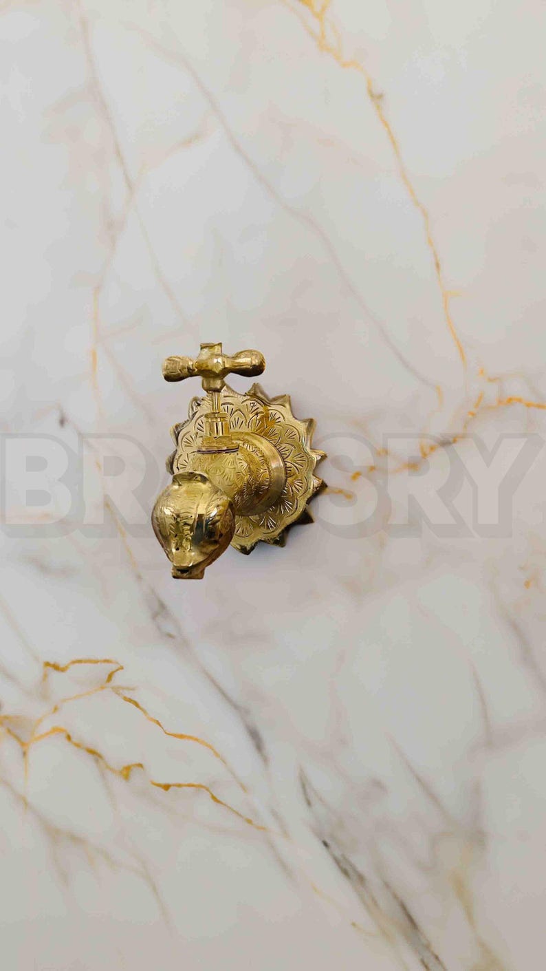 Handcrafted Moroccan Unlacquered Brass Fish-Shaped Wall-Mount Faucet – Vintage Solid Brass Tap for Bathroom, Kitchen, or Garden
Handcrafted Moroccan Unlacquered Brass Fish-Shaped Wall-Mount Faucet – Vintage Solid Brass Tap for Bathroom, Kitchen, or Garden
