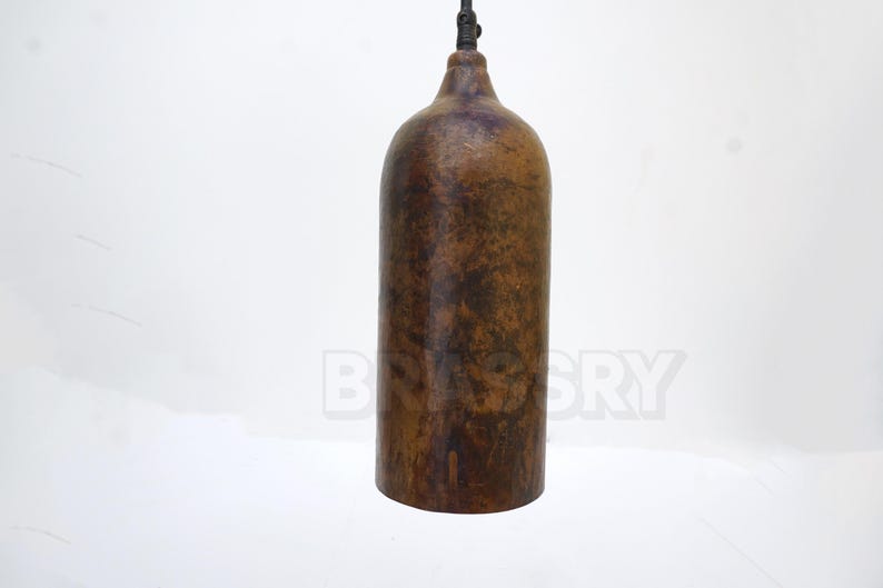 Handcrafted Moroccan copper bottle pendant light with aged patina finish