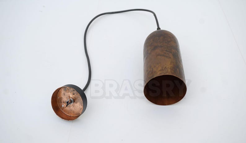 Handcrafted Moroccan copper bottle pendant light with aged patina finish