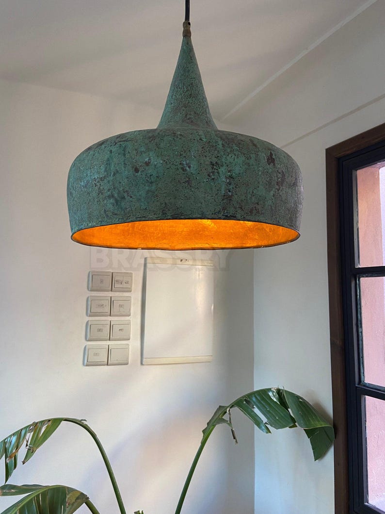 Handcrafted Moroccan hammered copper pendant light with aged finish, artisan-made dome lamp for kitchen islands, dining rooms, boho and rustic interiors

