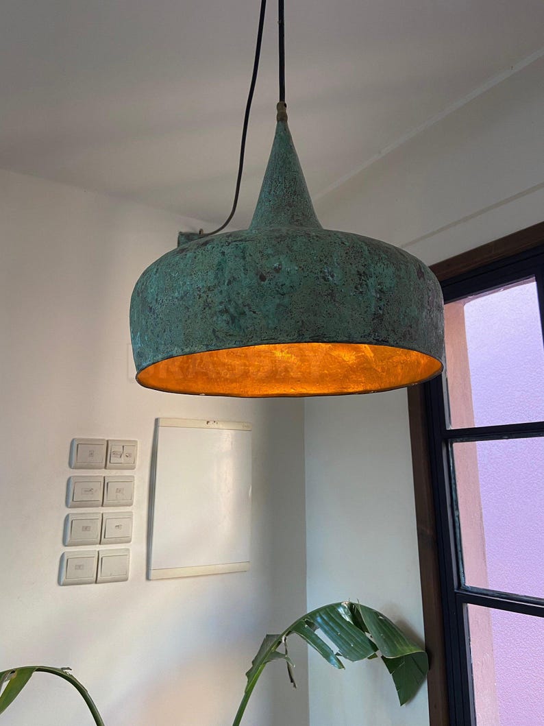 Handcrafted Moroccan hammered copper pendant light with aged finish, artisan-made dome lamp for kitchen islands, dining rooms, boho and rustic interiors

