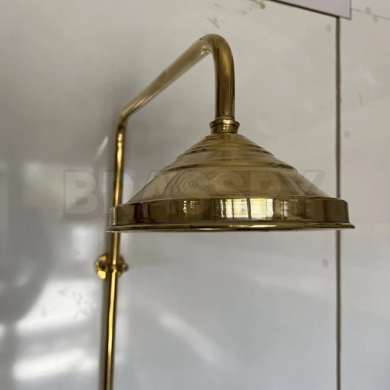 Handcrafted vintage brass shower with dual cross handles

