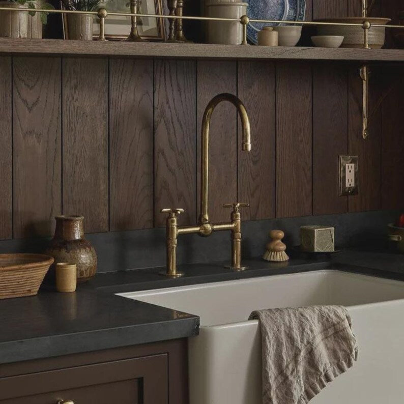 Handmade Moroccan wall-mount faucet in solid unlacquered brass with gooseneck spout and cross handles

