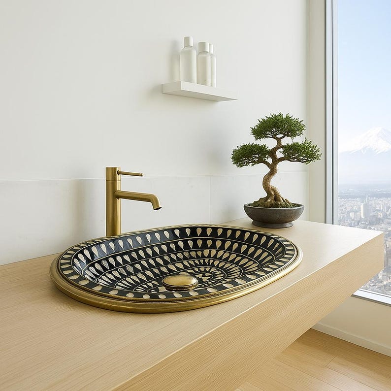Handmade black oval brass bathroom sink with ivory bone and resin inlay

