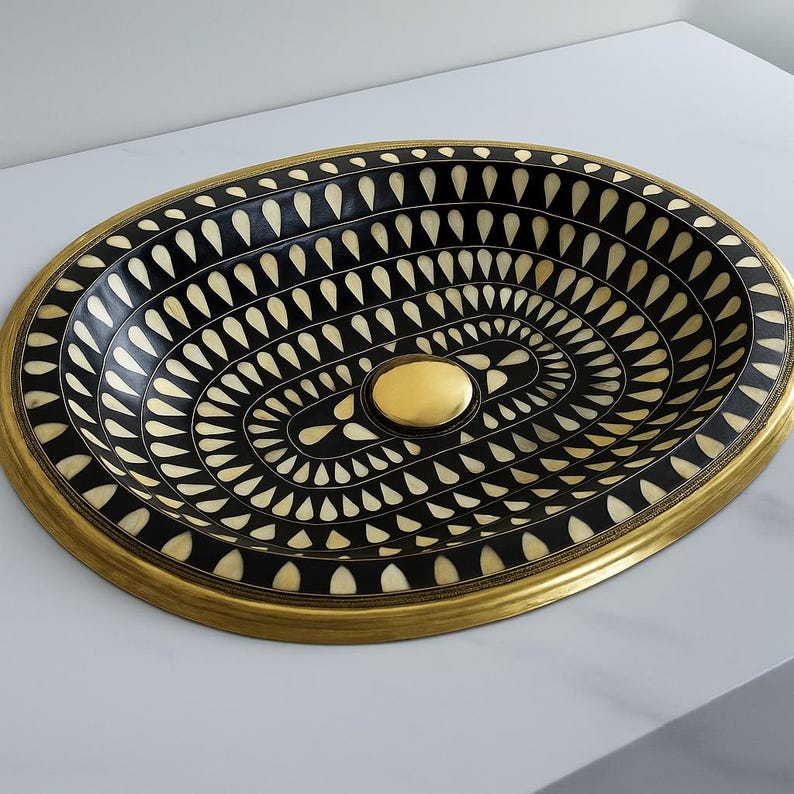 Handmade black oval brass bathroom sink with ivory bone and resin inlay


