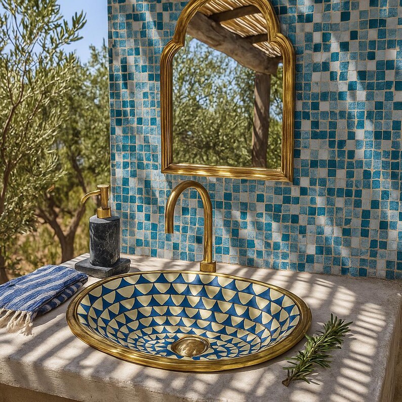 Handmade blue resin sink with bone inlay and brass rim