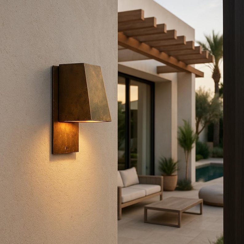 Handmade brass light fixture for modern interiors and gallery walls