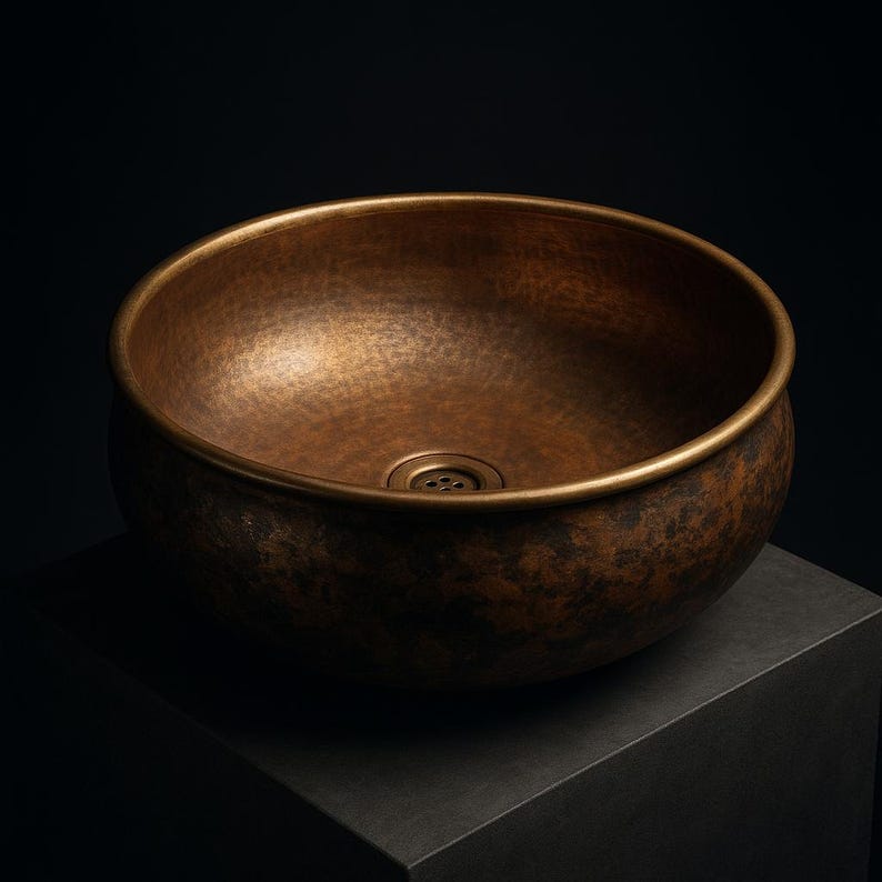 Handmade copper and brass bathroom sink with rustic patina finish