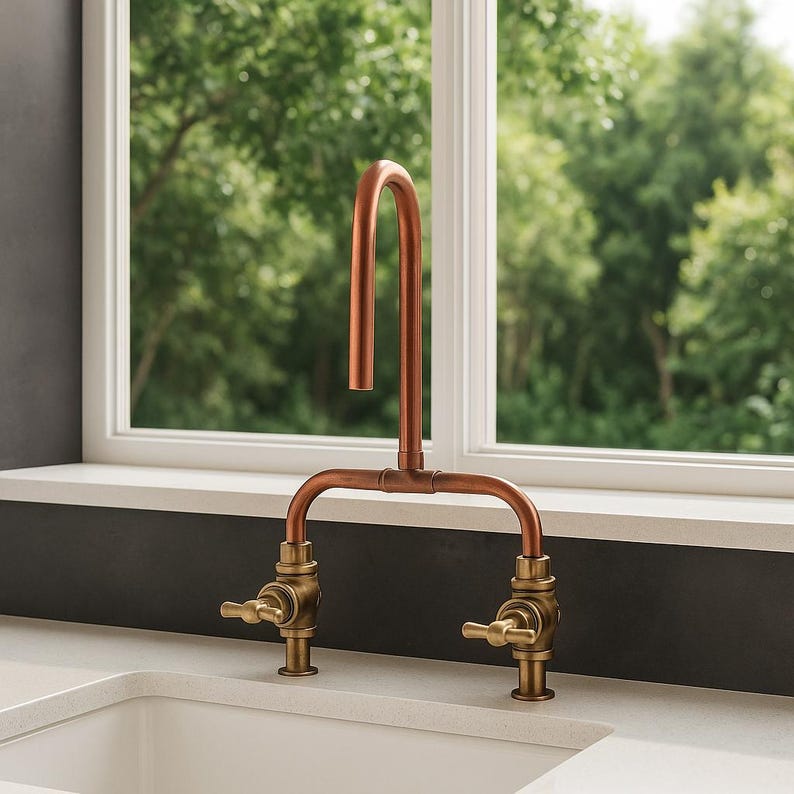 Handmade copper and brass faucet with U-shaped spout

