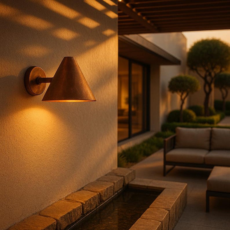 Handmade copper wall light with funnel design – artisan lighting for architectural homes

