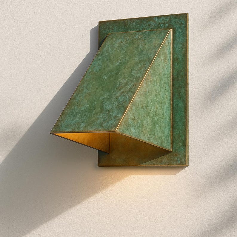 Handmade green patina brass wall sconce with geometric design