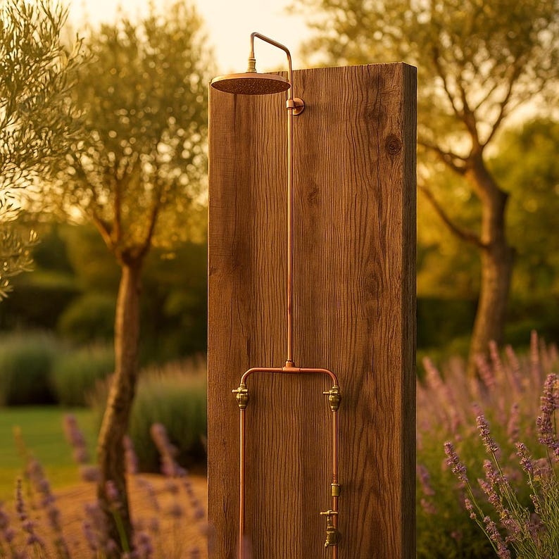 Handmade outdoor copper shower with foot tap and brass shower head

