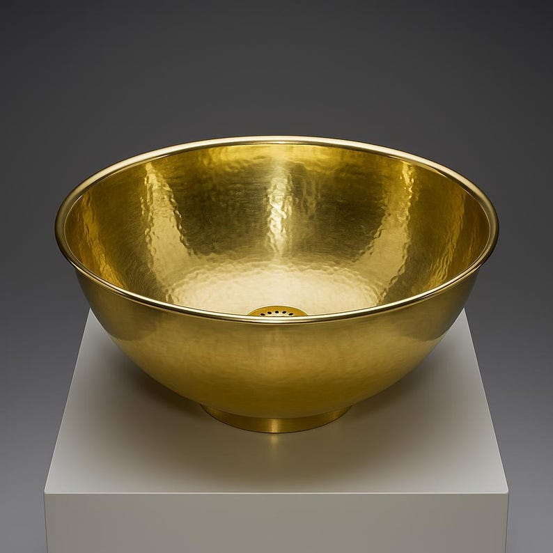 Round handmade brass bathroom basin with polished finish
