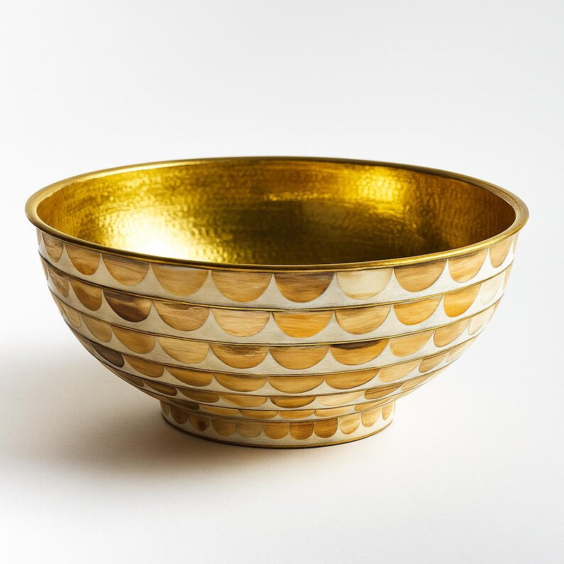 Handmade round brass vessel sink with hammered gold interior and ivory-toned wood inlays – countertop bathroom basin

