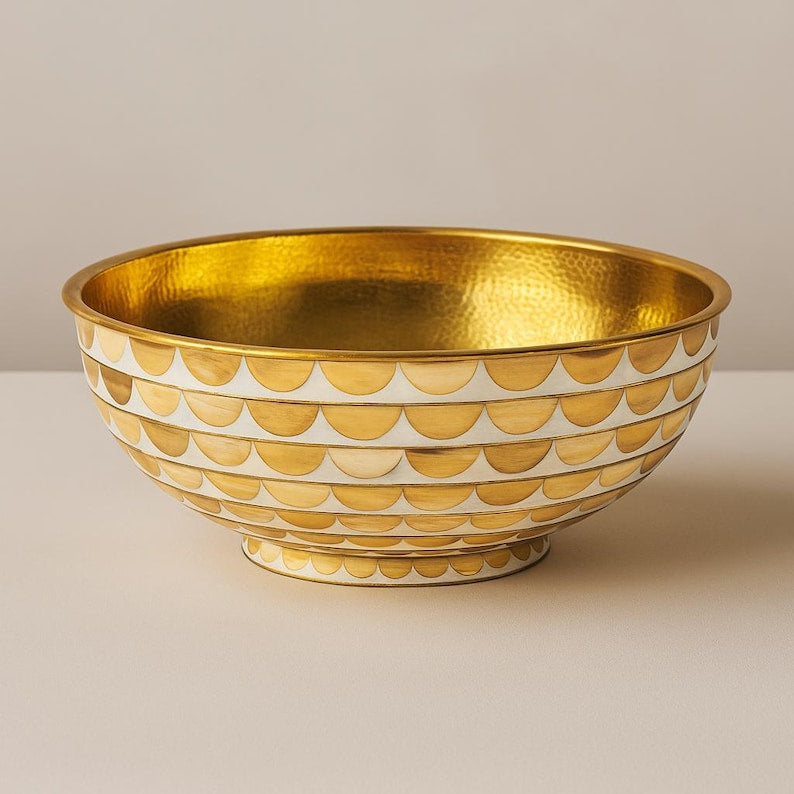 Handmade round brass vessel sink with hammered gold interior and ivory-toned wood inlays – countertop bathroom basin

