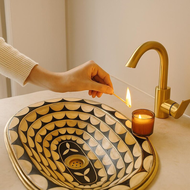Luxury oval bathroom vanity basin in black and gold