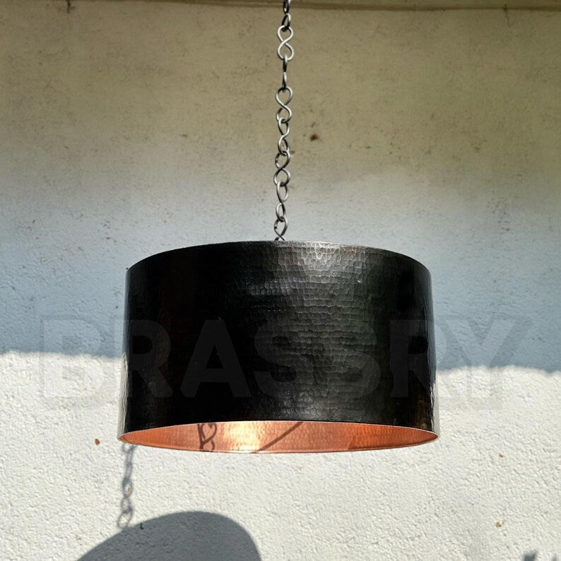 Large cylindrical black copper ceiling light for modern rustic interiors

