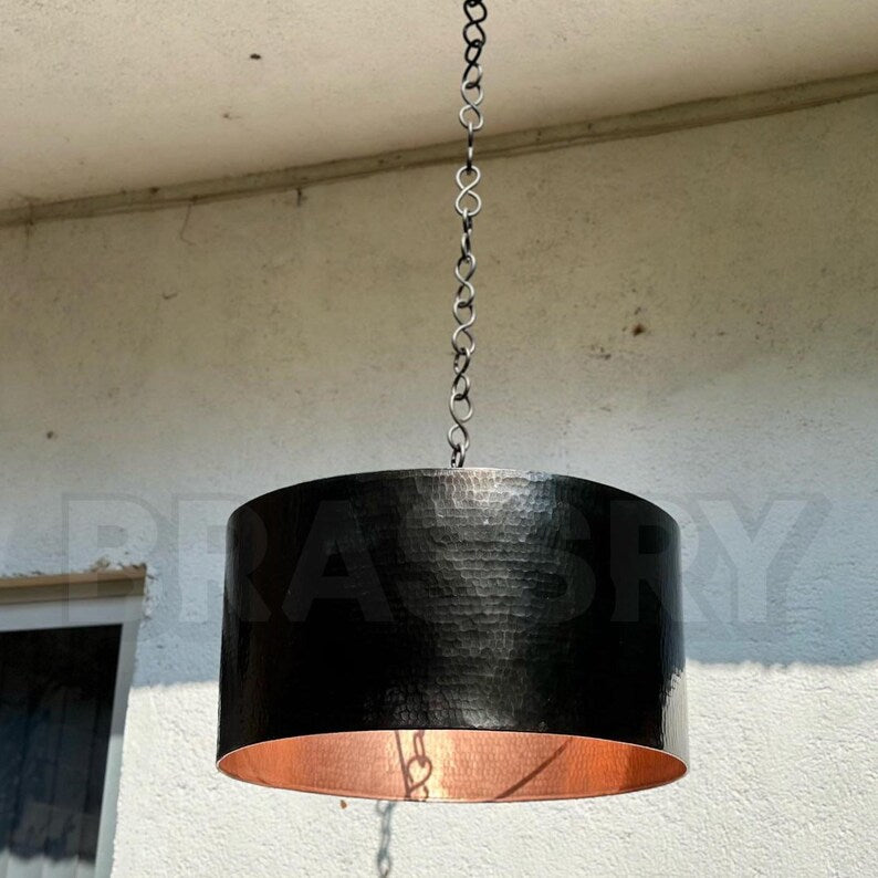 Artisan-made Moroccan black and copper drum light with industrial chain

