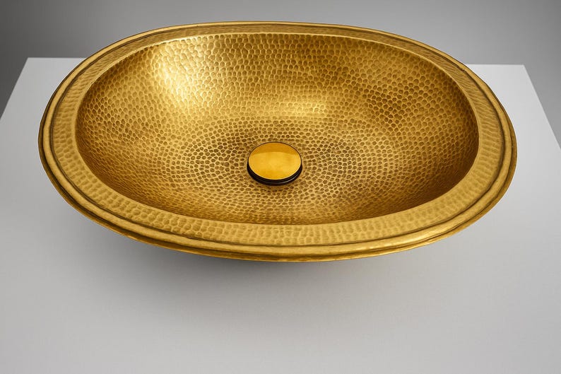 Multiple sizes of oval hammered brass bathroom sink
