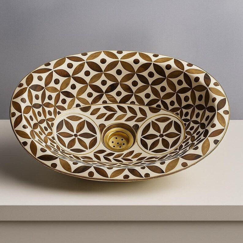 Oval drop-in vessel sink with flower of life pattern
