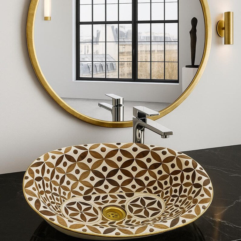 Oval drop-in vessel sink with flower of life pattern