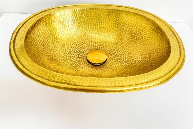 Multiple sizes of oval hammered brass bathroom sinkv