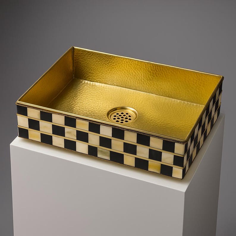 Rectangular brass sink with checkered bone inlay – top view