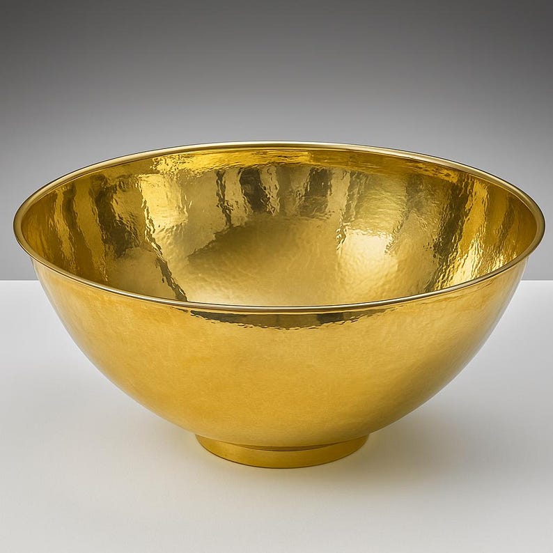 Round handmade brass bathroom basin with polished finish