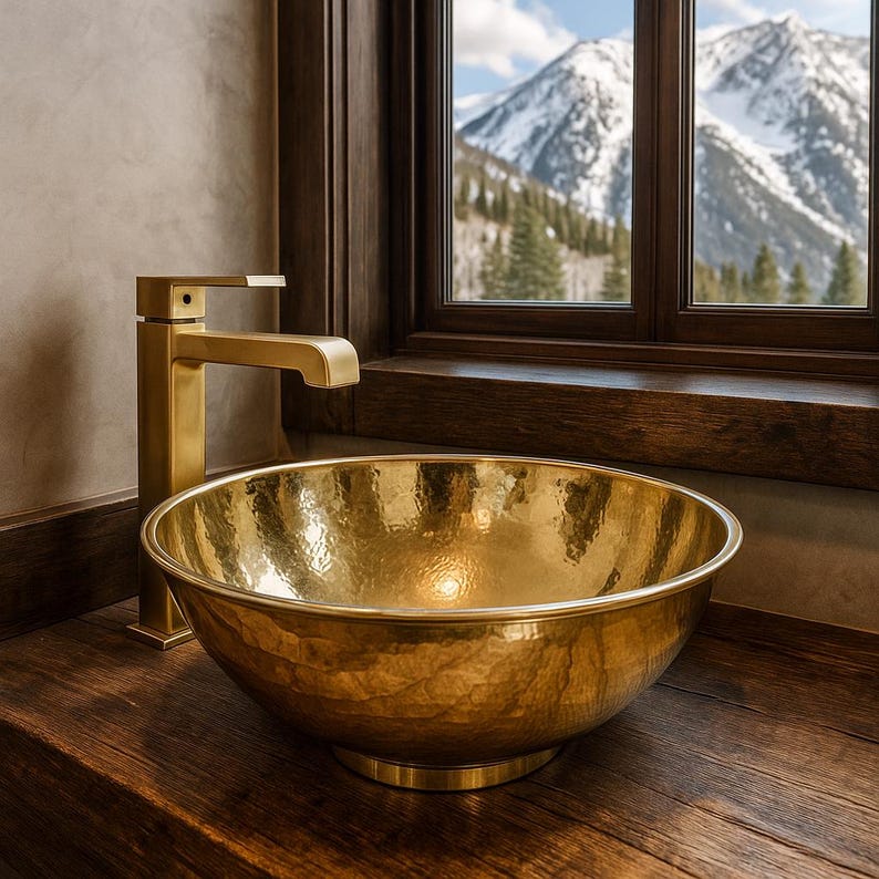 Round handmade brass bathroom basin with polished finish