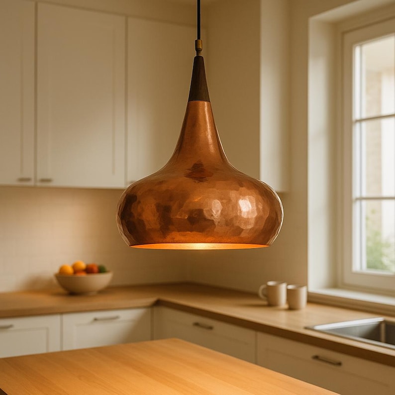Solid copper pendant light in garden dining area

