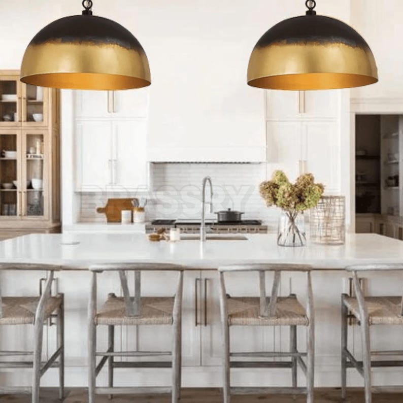 Rusted Moroccan copper dome pendant light over kitchen island

