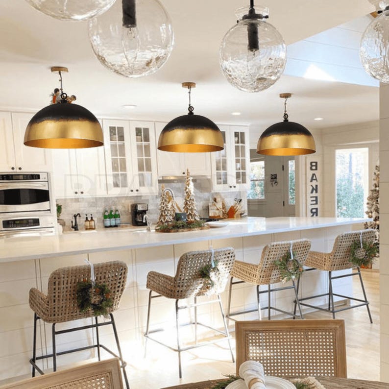 Rusted Moroccan copper dome pendant light over kitchen island

