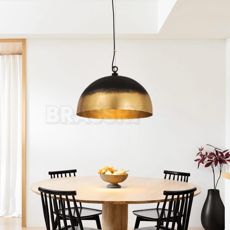 Rusted Moroccan copper dome pendant light over kitchen island

