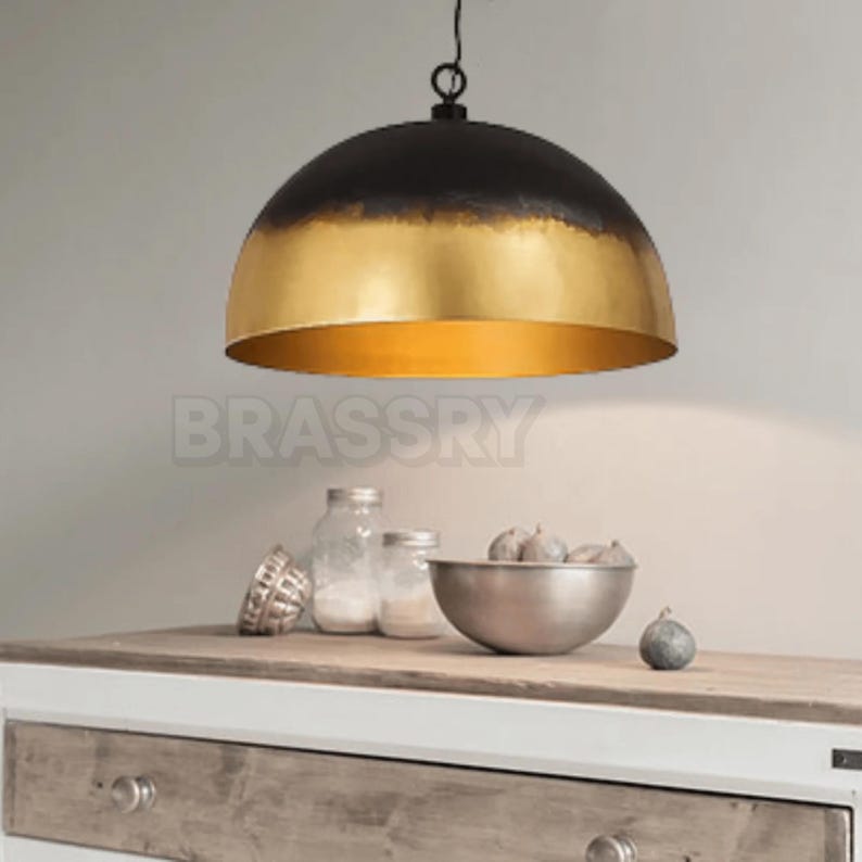 Rusted Moroccan copper dome pendant light over kitchen island

