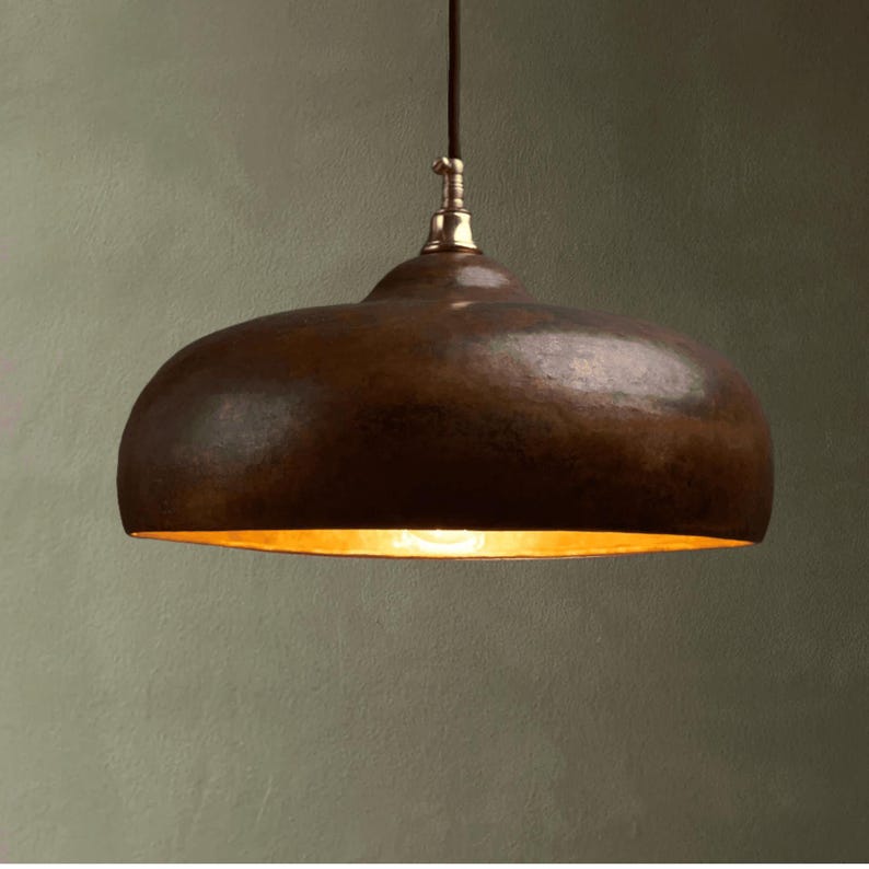 Rustic Moroccan hammered copper dome pendant light with aged finish

