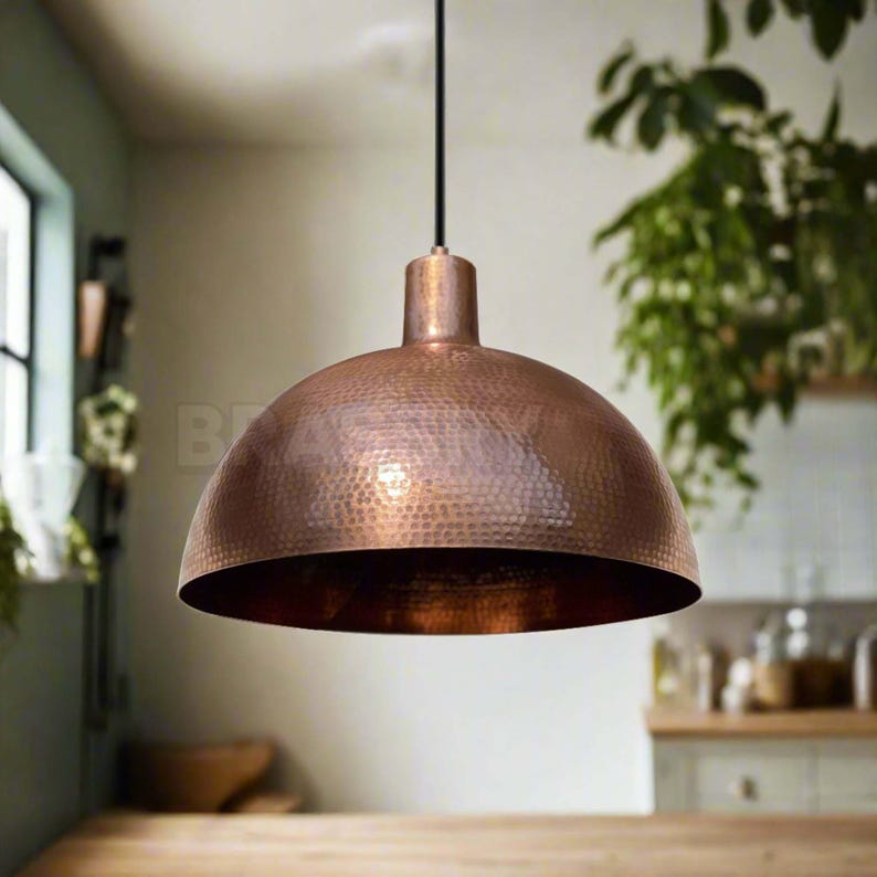 Rustic Moroccan hammered copper dome pendant light with aged finish

